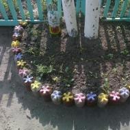 DIY na bulaklak mula sa mga plastik na bote: cornflower, rosas at clivias